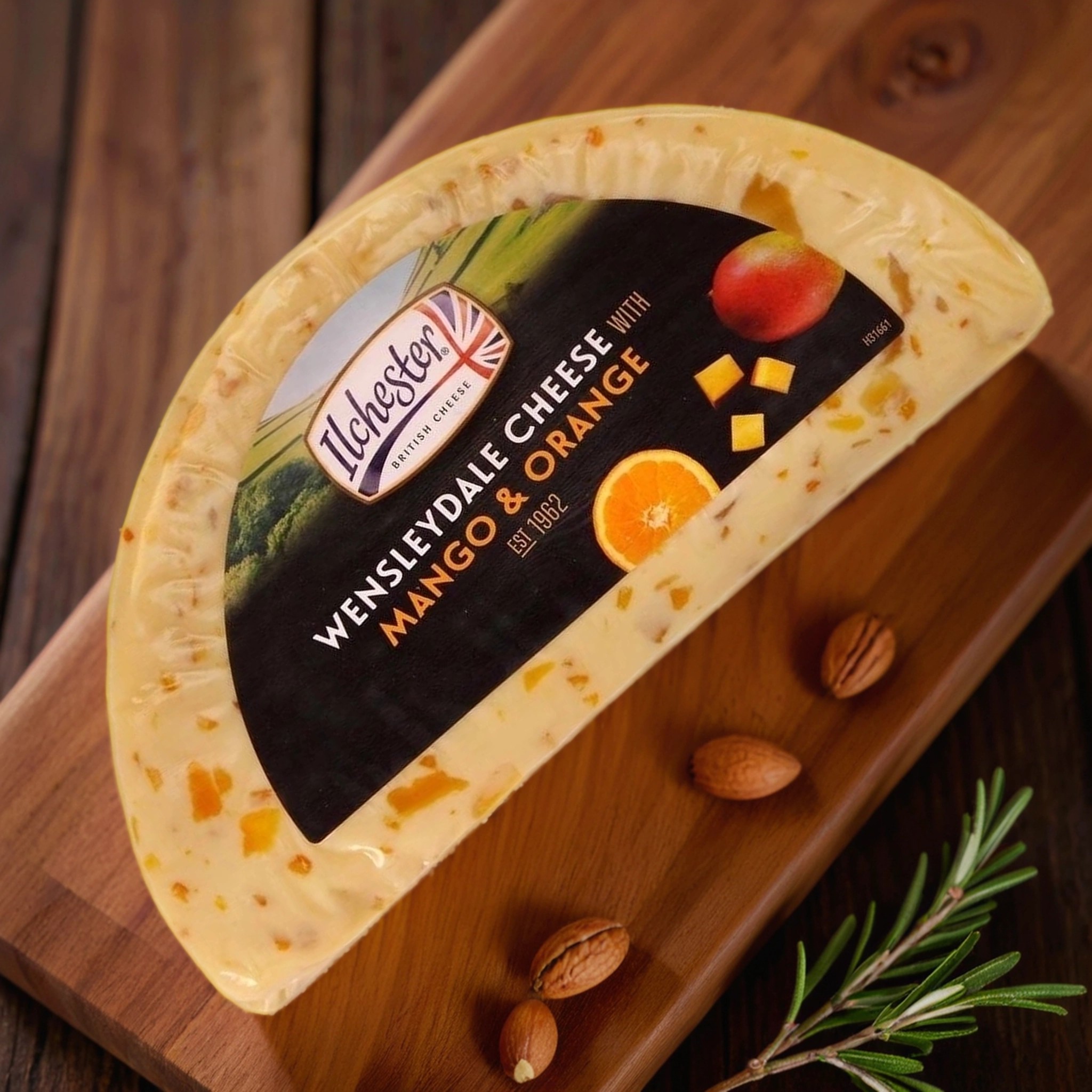 Британский мягкий сыр с манго и апельсин.Wensleydale гол.=1,5кг.цена за1кг.